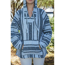 Front view of woman wearing the sky blue mexican baja hoodie.