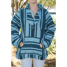 Styled on model, blue baja hoodie