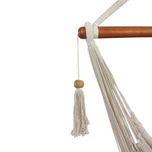 Manyana white hammock chair closeup of wooden bar and tassel
