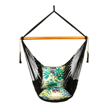 Front view of black hammock chair styled with cushions.