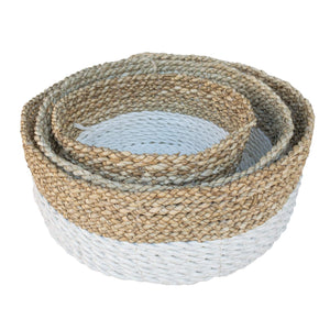 Set of three white low baskets